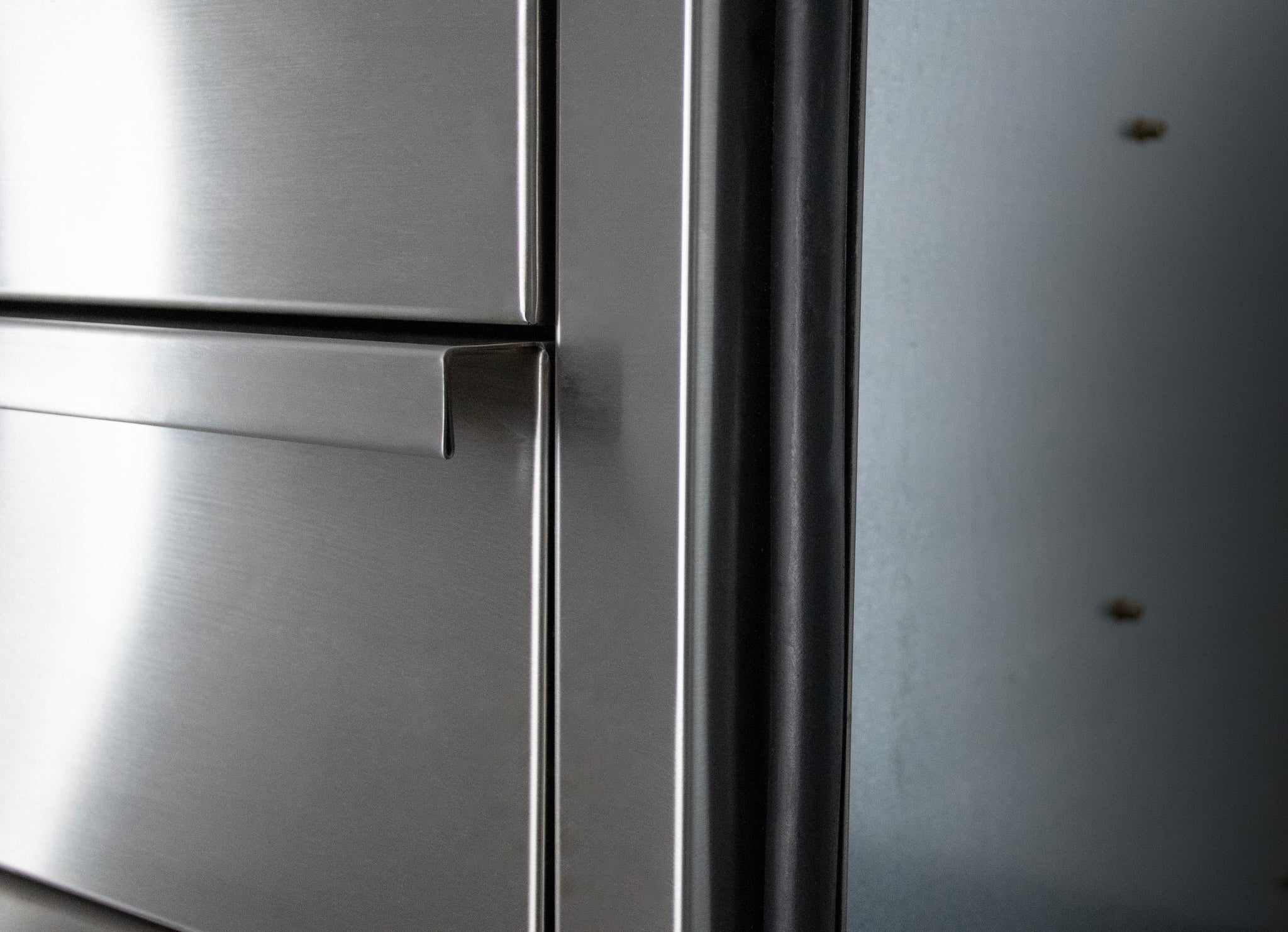 AMG Deluxe drawer storage, stainless steel handle detail