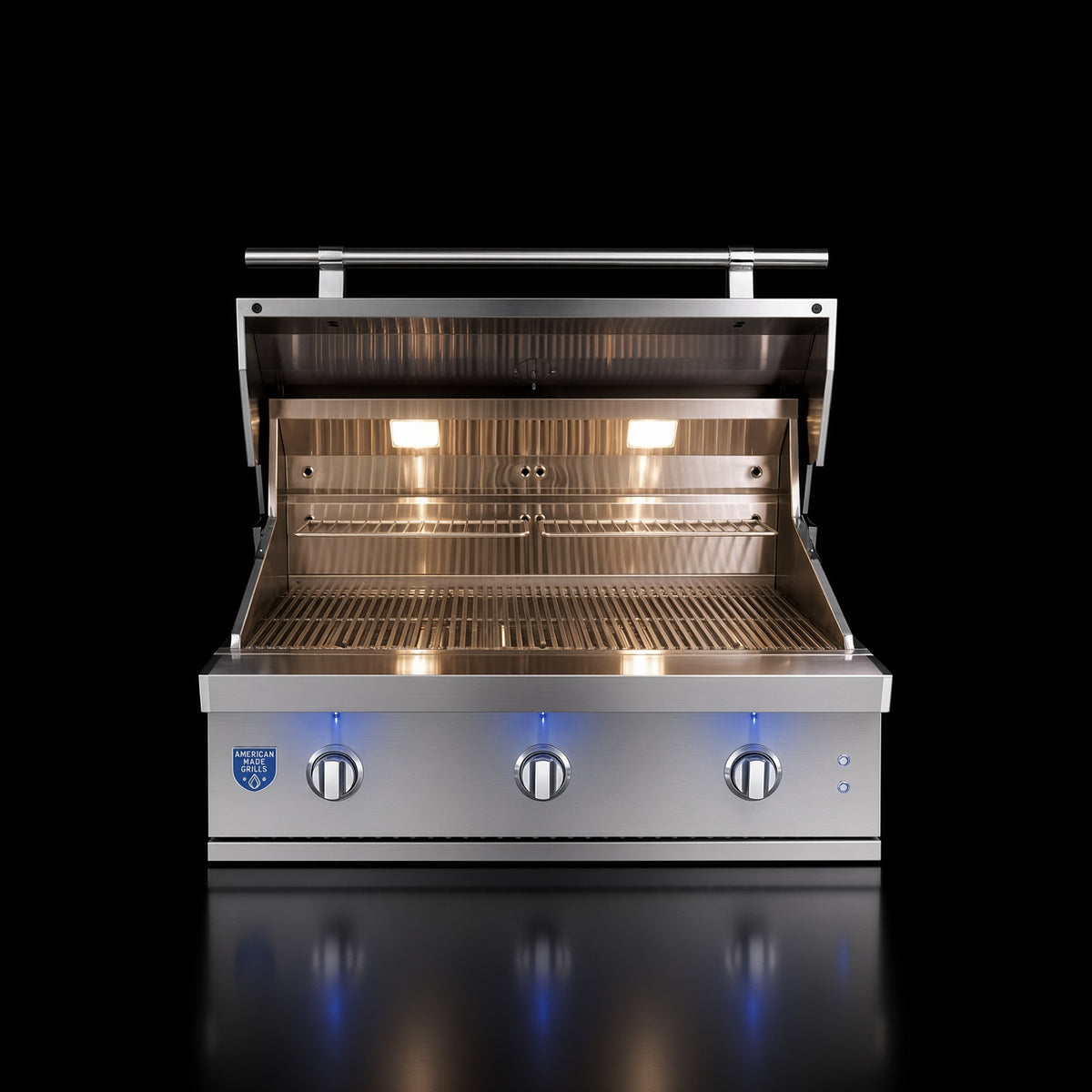 American Made Grills Atlas 36" Built-In Grill, open hood showing interior lighting and grates