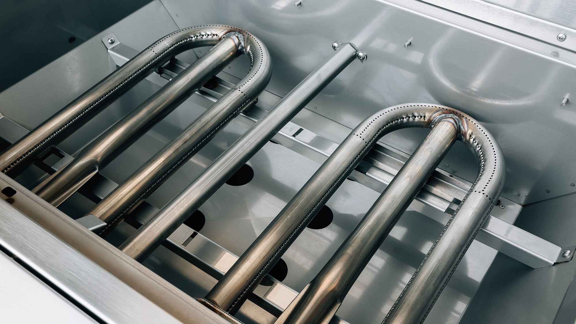 Estate Freedom 42" Built-In Grill, stainless U-tube burners close-up