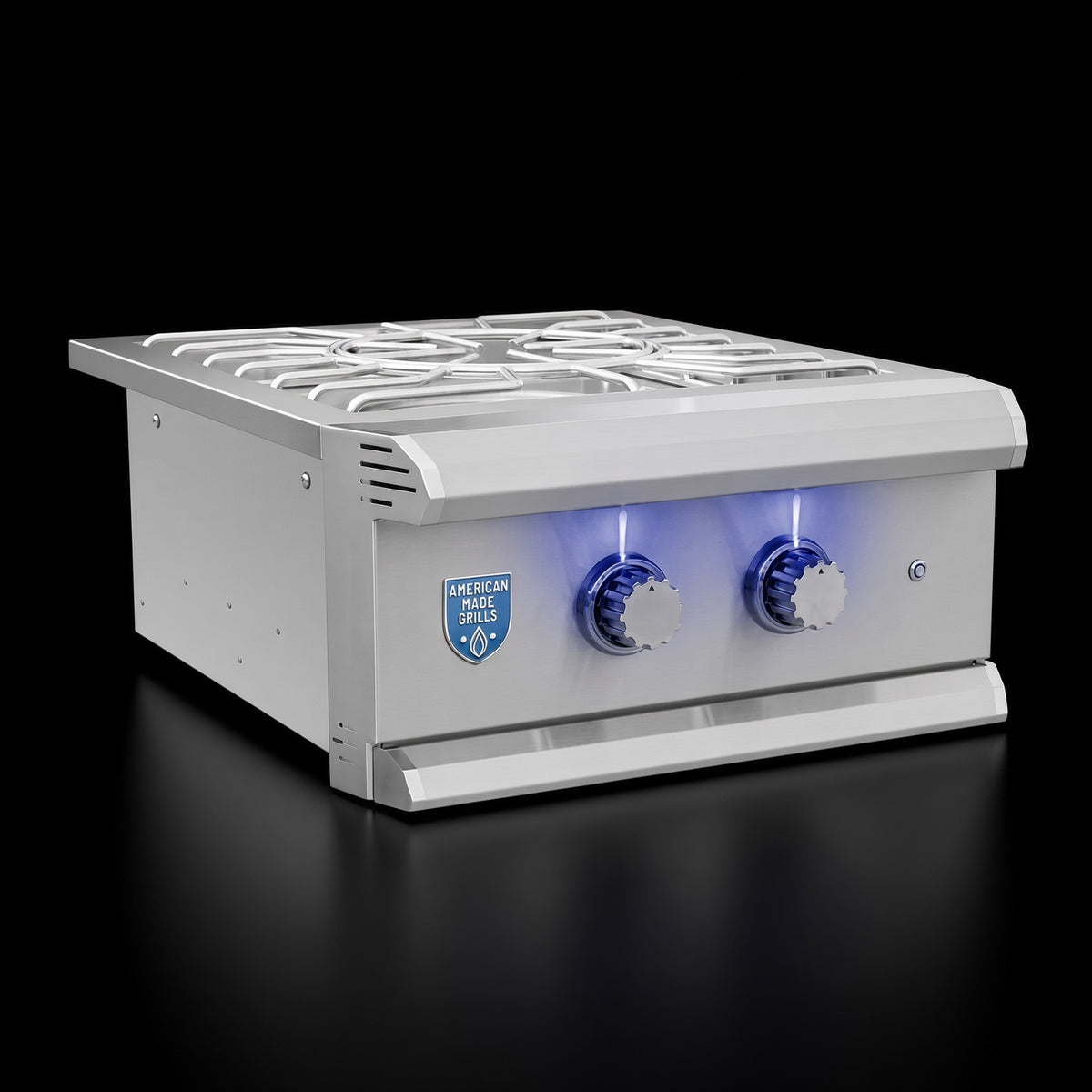 Atlas Power Burner cooktop grates and dual control knobs, close-up front view